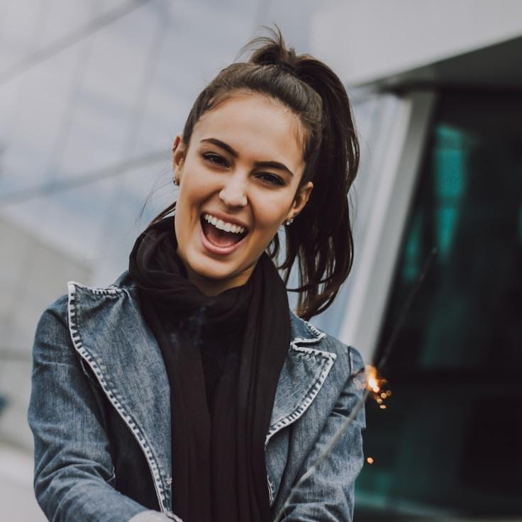 Alex Morgan, Lead Design Curator at Sustainable Growth Living, reviewing corporate floral arrangements